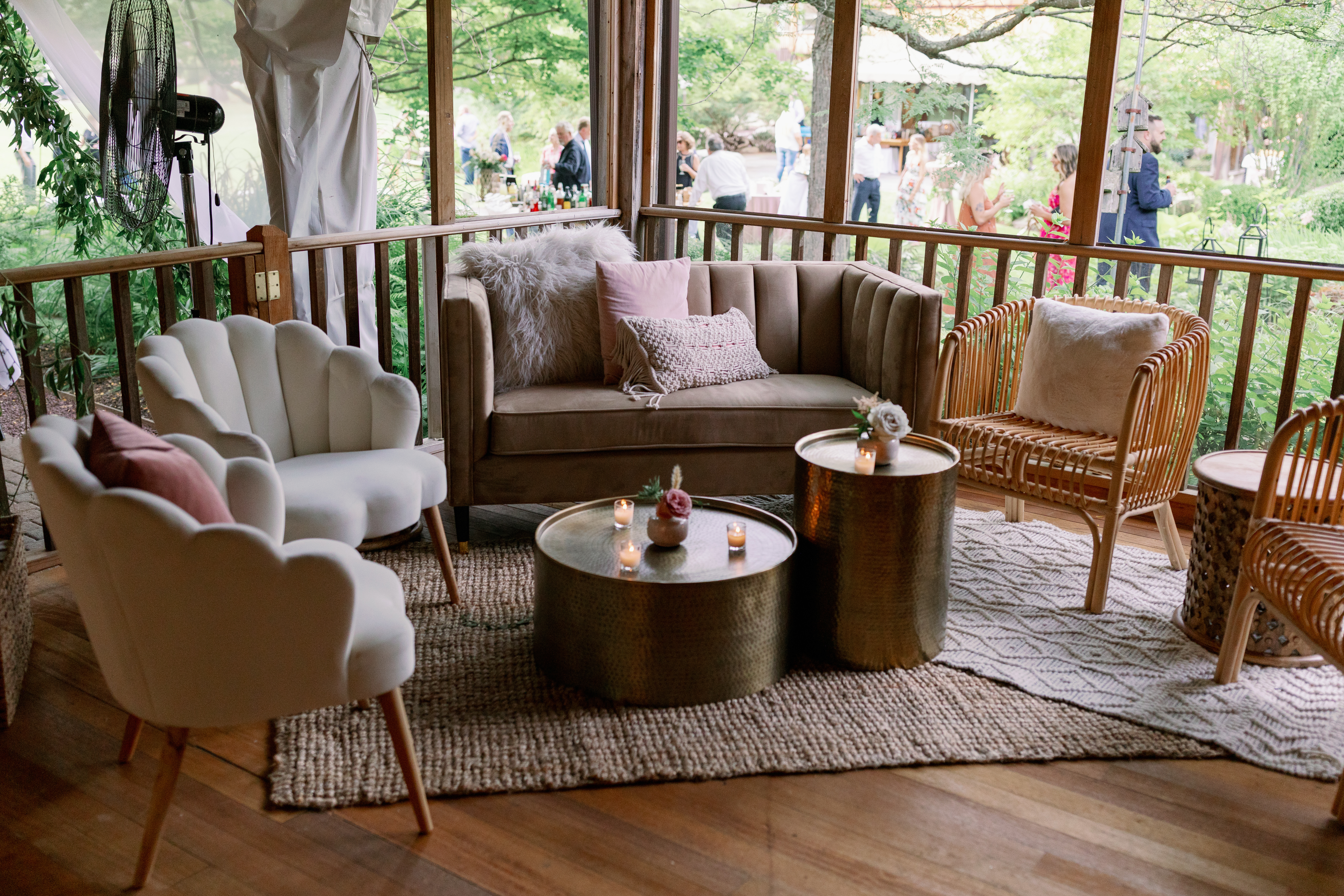 cozy screened in porch with comfortable chairs